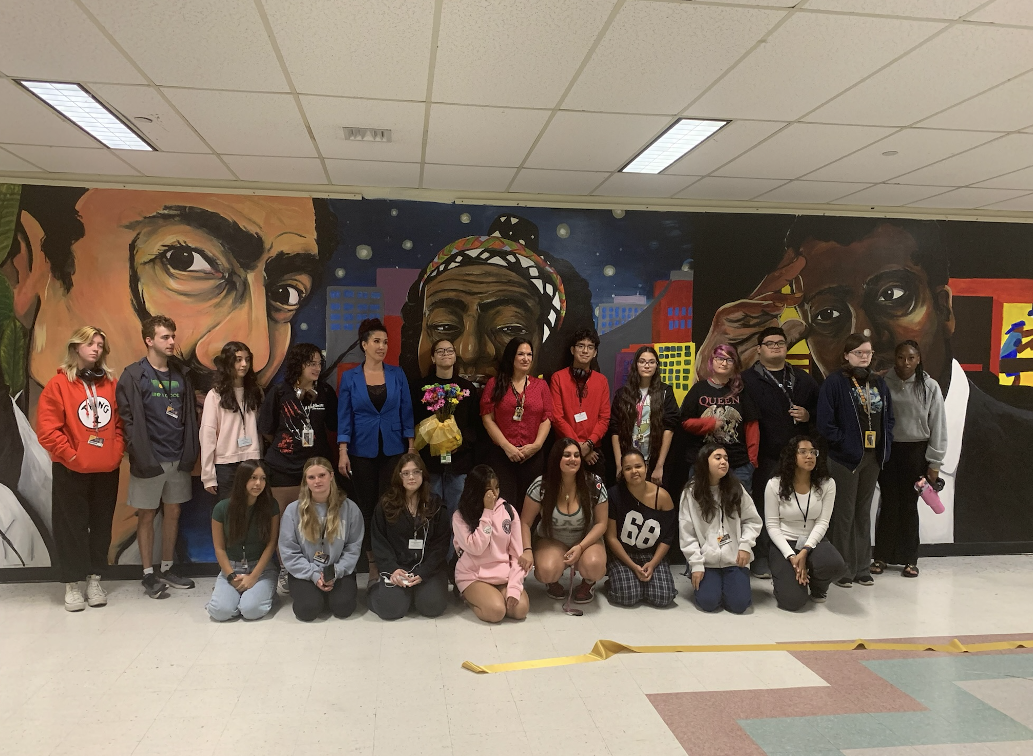 Western High School art students together with the finished Wall of Artists mural